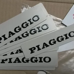 Nuova Collezione TARGHETTA LAMIERA ADESIVA ” PIAGGIO “